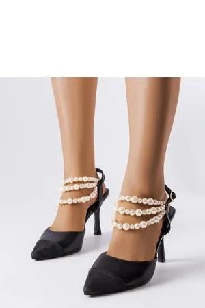 Elegant black high heels with pearls